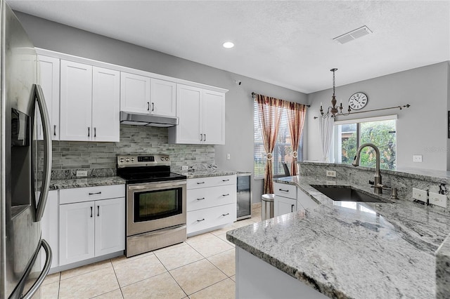 kitchen featuring white cabinetry, sink, and stainless steel appliances