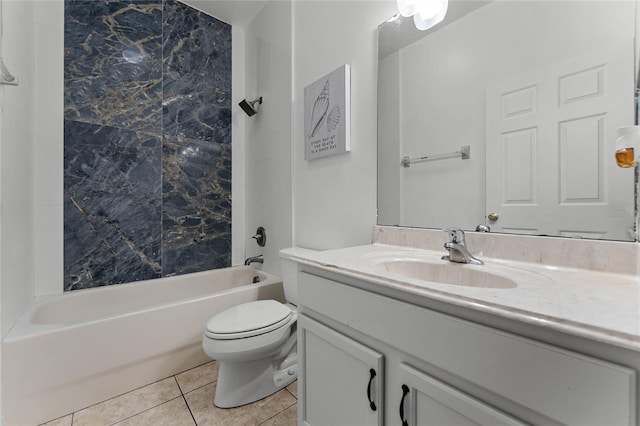 full bathroom featuring toilet, vanity, tiled shower / bath combo, and tile patterned floors