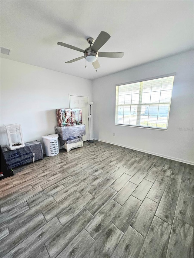 unfurnished room featuring ceiling fan