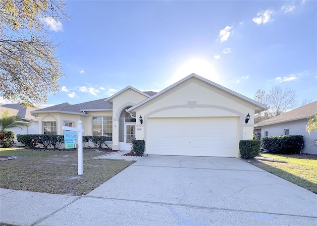 single story home featuring a garage