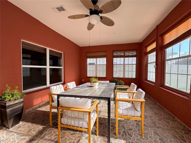 dining room featuring plenty of natural light and ceiling fan