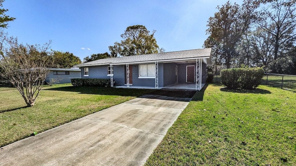 single story home with a front yard