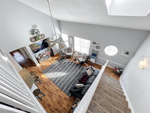 5269 Wellington Park Cir Unit 23, Orlando, FL 32839 - living room featuring wood finished floors and high vaulted ceiling