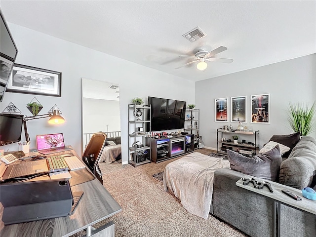 living room featuring ceiling fan and light colored carpet