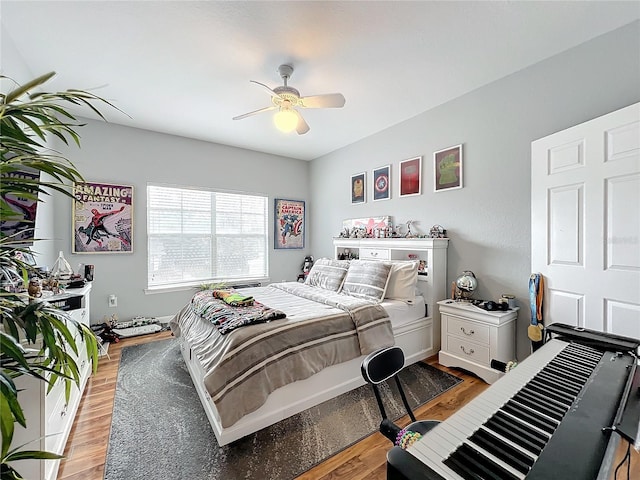 5269 Wellington Park Cir Unit 23, Orlando, FL 32839 - bedroom featuring wood finished floors and ceiling fan