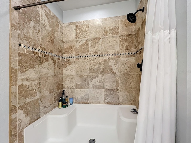 bathroom featuring walk in shower