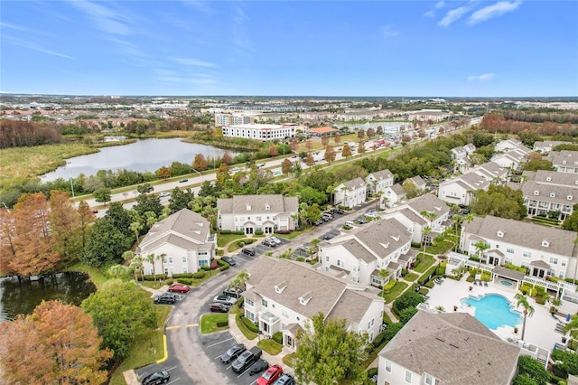 drone / aerial view with a water view