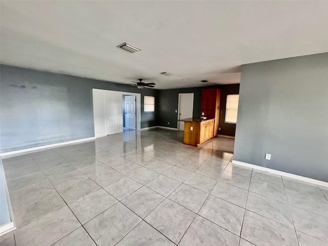 empty room featuring ceiling fan