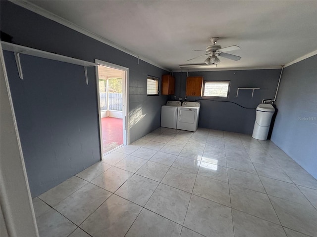 clothes washing area featuring ceiling fan, cabinets, independent washer and dryer, and a wealth of natural light