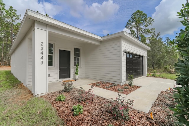 exterior space with a garage