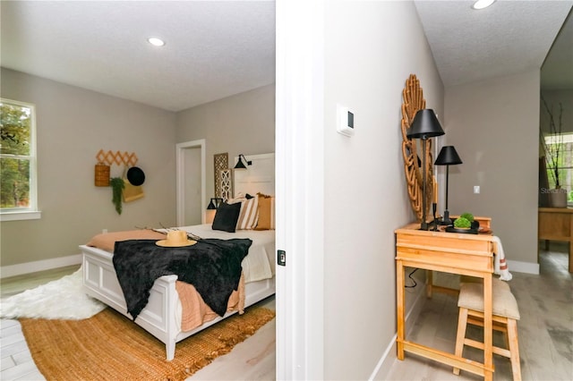 bedroom featuring light hardwood / wood-style floors