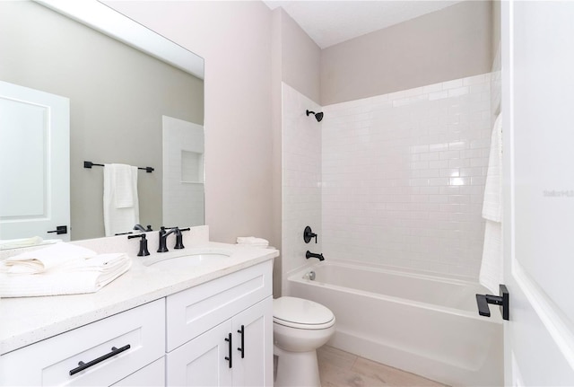 full bathroom with tile patterned flooring, vanity, shower / bathtub combination, and toilet