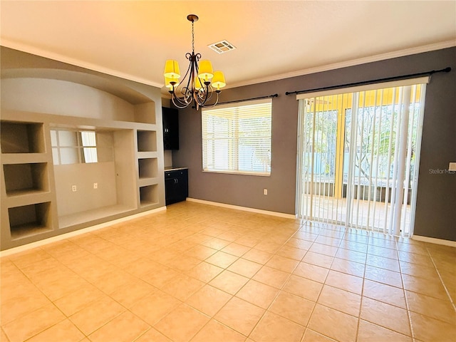 unfurnished living room featuring built in shelves, light tile patterned floors, a chandelier, and ornamental molding