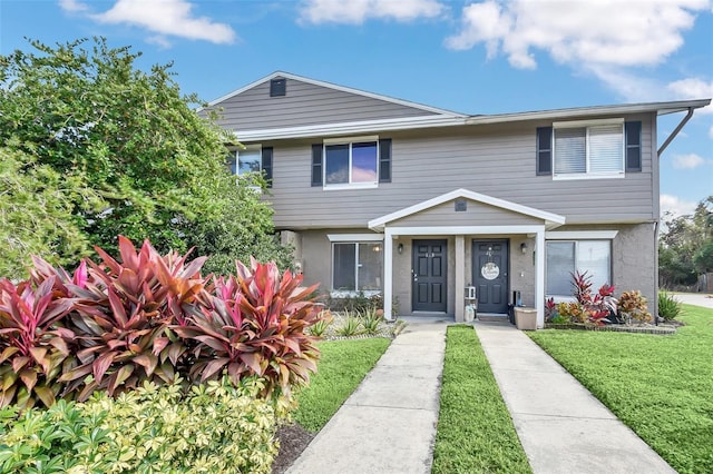 view of front of house featuring a front lawn