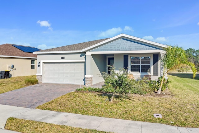 ranch-style home with a garage and a front yard