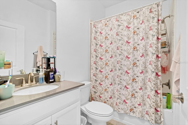 full bathroom with vanity, toilet, and shower / bath combo