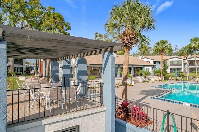 view of swimming pool with a pergola and a patio area