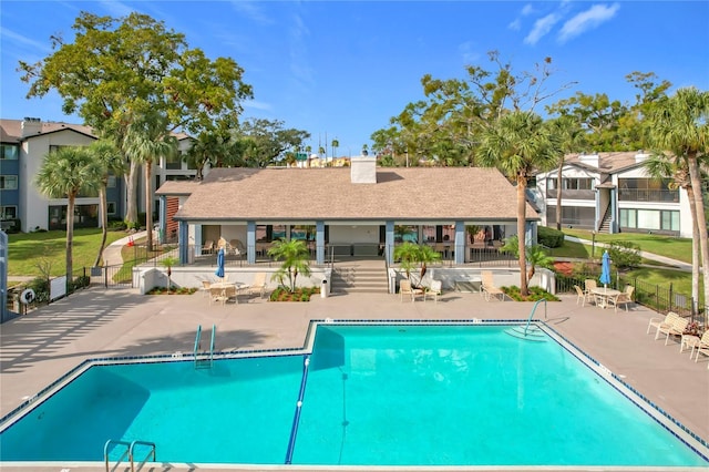 view of pool featuring a patio area