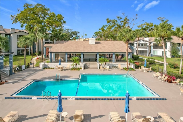 view of pool featuring a patio