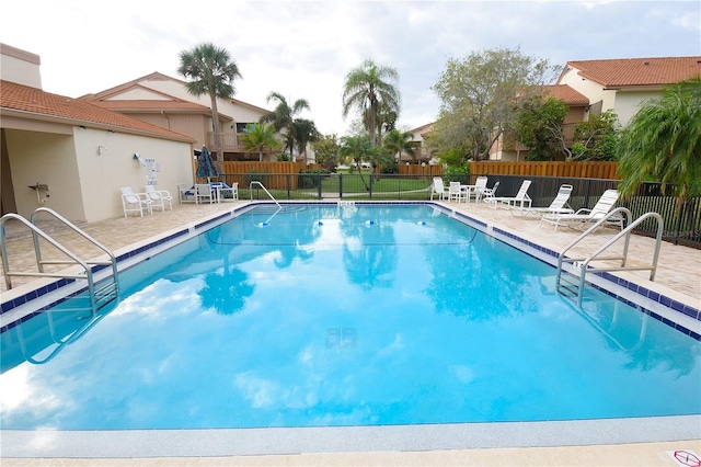 view of pool featuring a patio area