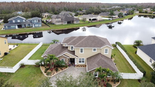 birds eye view of property featuring a water view