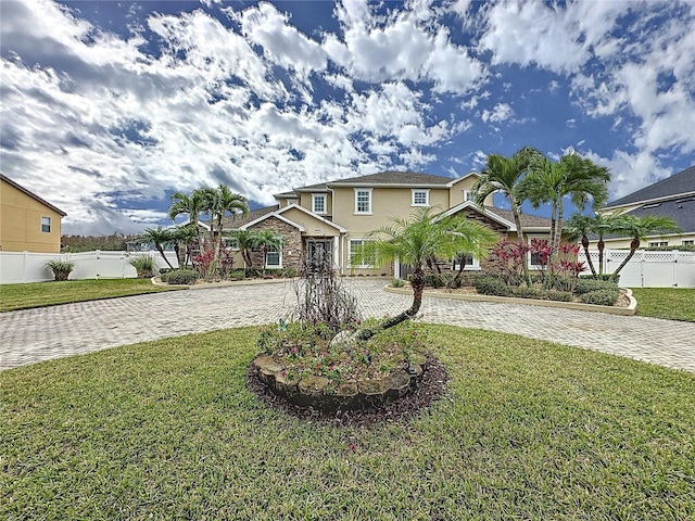 view of front facade with a front lawn