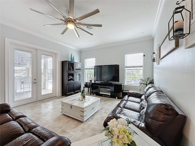 tiled living room featuring french doors, a textured ceiling, ceiling fan, and ornamental molding