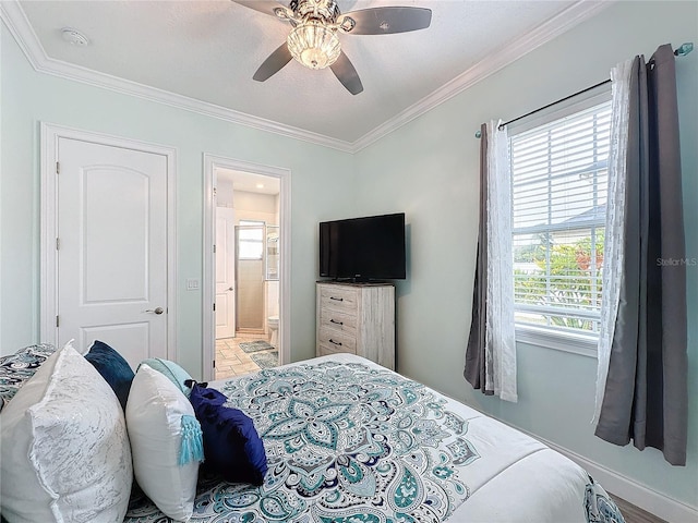 bedroom featuring connected bathroom, ceiling fan, and crown molding