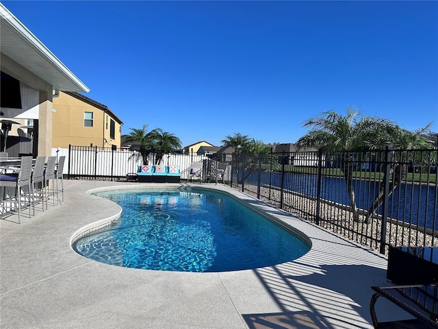 view of swimming pool featuring a patio