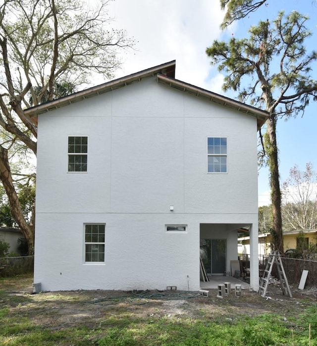 rear view of house with a patio