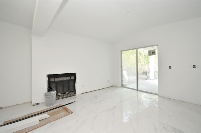 living room featuring vaulted ceiling