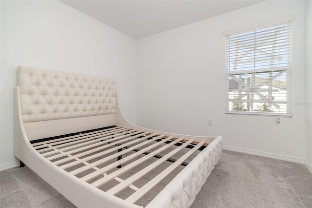 unfurnished bedroom with light carpet