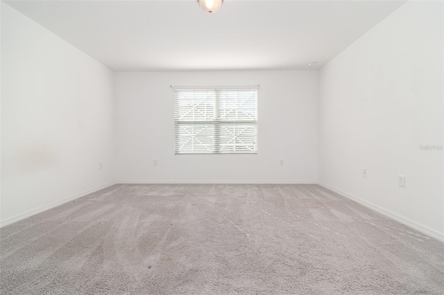 unfurnished room with carpet floors