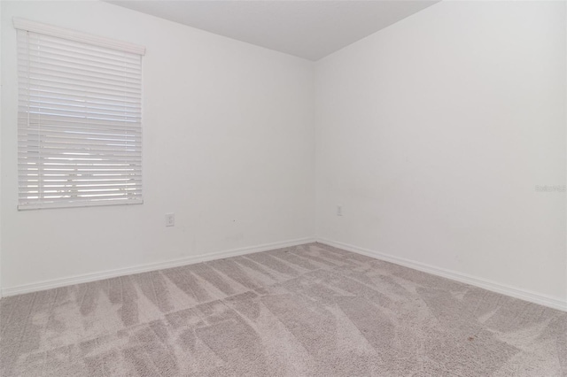 spare room with carpet flooring