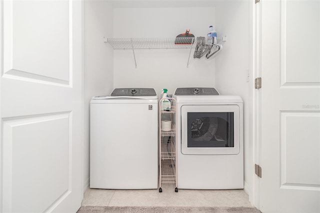 washroom featuring separate washer and dryer