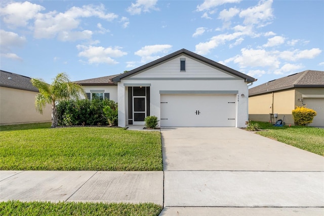 ranch-style house featuring a front yard and a garage