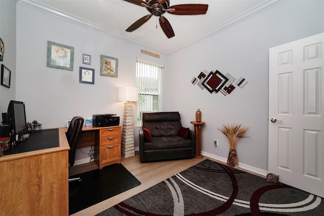 office featuring light wood-type flooring, ceiling fan, and crown molding