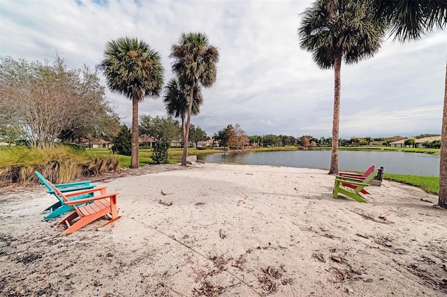 surrounding community featuring a water view