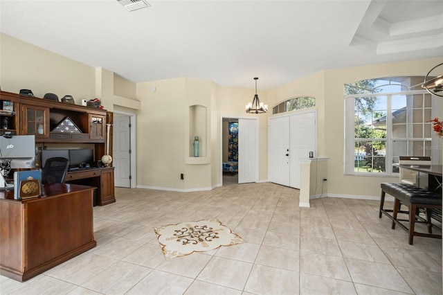 home office featuring a chandelier and light tile patterned flooring