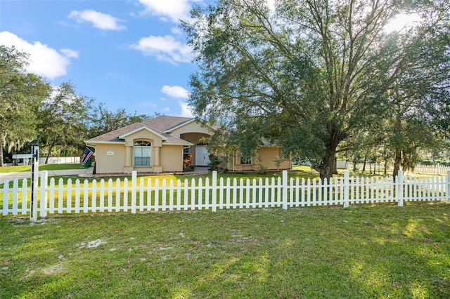 view of front of house with a front yard