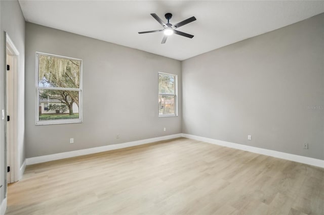 unfurnished room featuring light hardwood / wood-style floors and ceiling fan