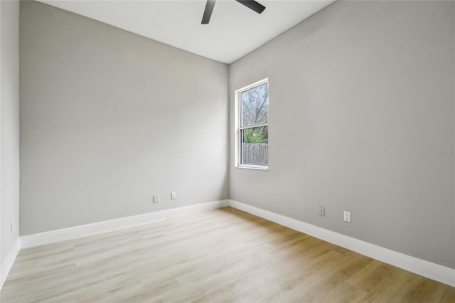 unfurnished room featuring light hardwood / wood-style floors and ceiling fan