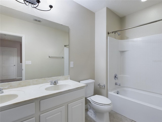 full bathroom featuring tile patterned floors, vanity, shower / bath combination, and toilet