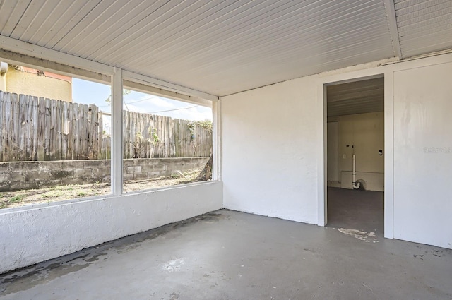 unfurnished sunroom with plenty of natural light