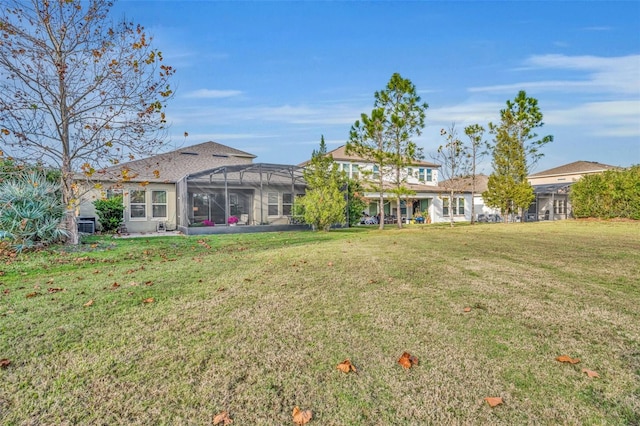 view of yard with a lanai