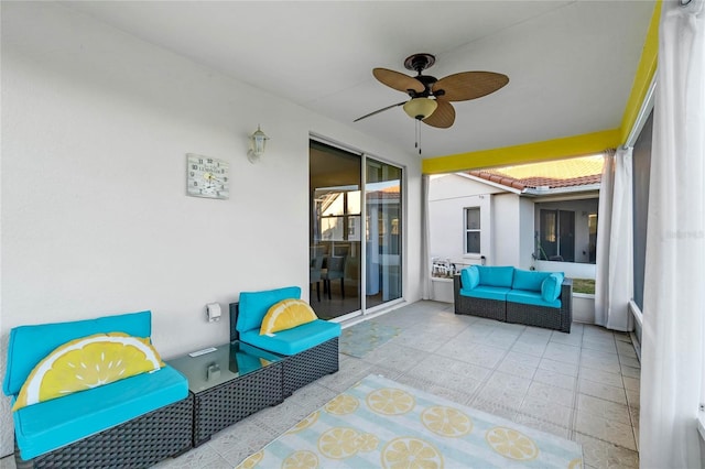 view of patio with an outdoor living space and ceiling fan