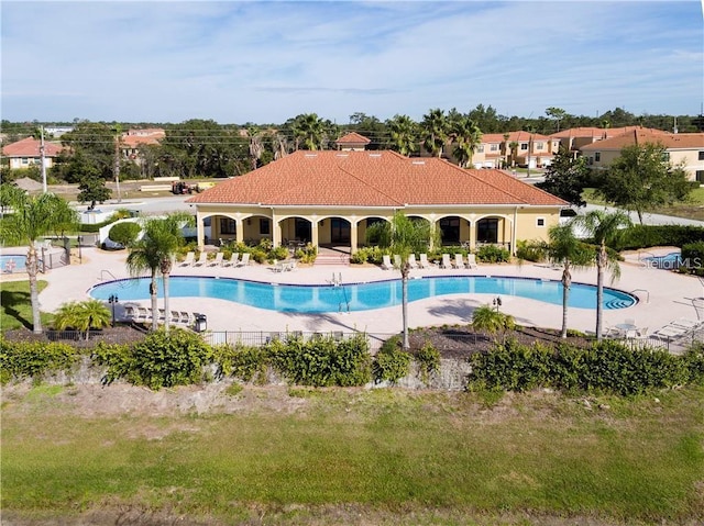 view of swimming pool with a patio