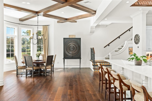 dining space with a healthy amount of sunlight, dark hardwood / wood-style floors, coffered ceiling, and beam ceiling