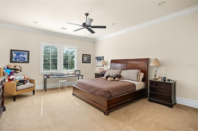 carpeted bedroom featuring ceiling fan and ornamental molding