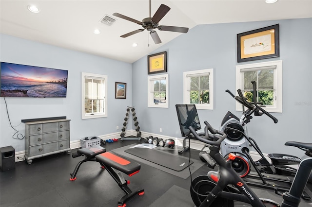 exercise area with ceiling fan and lofted ceiling